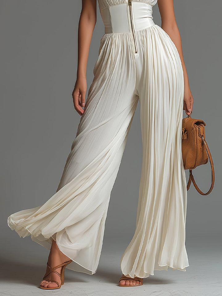 Mono di Chiffon Bianco Senza Maniche con Collo a V e Chiusura Frontale con Pieghe di Gamba Larga